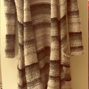 Knitted sweeper sweater